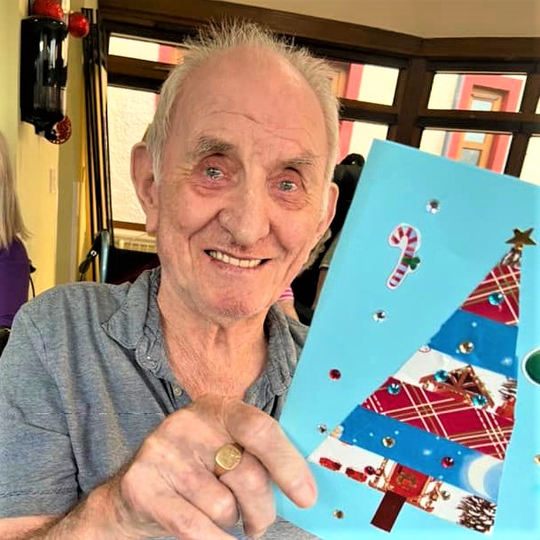 Residents with schools' Christmas cards