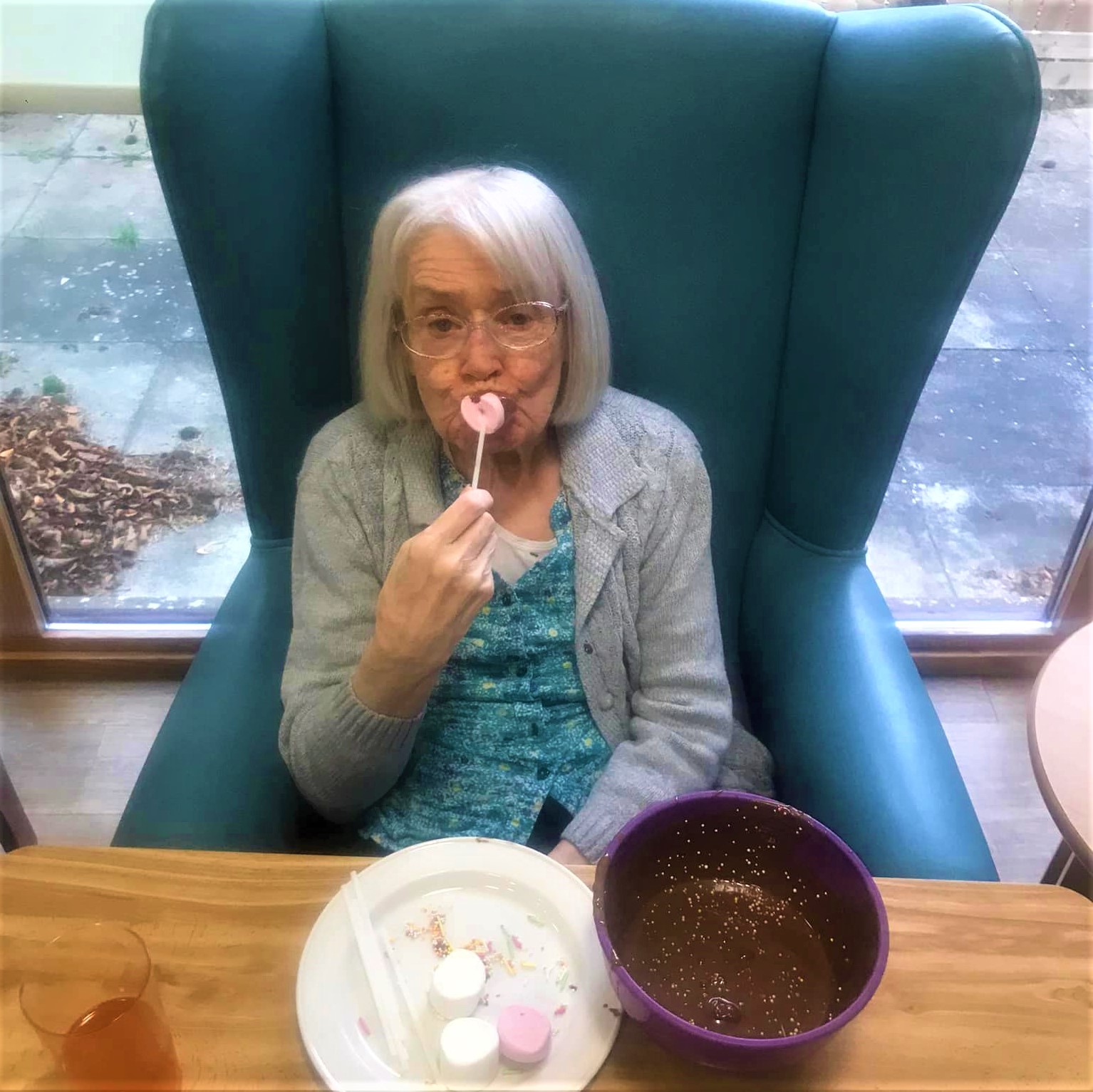 REsident eating dipping sweets for melted chocolate