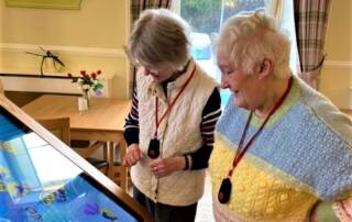Stormont Lodge - Residents with Tiny Tablet