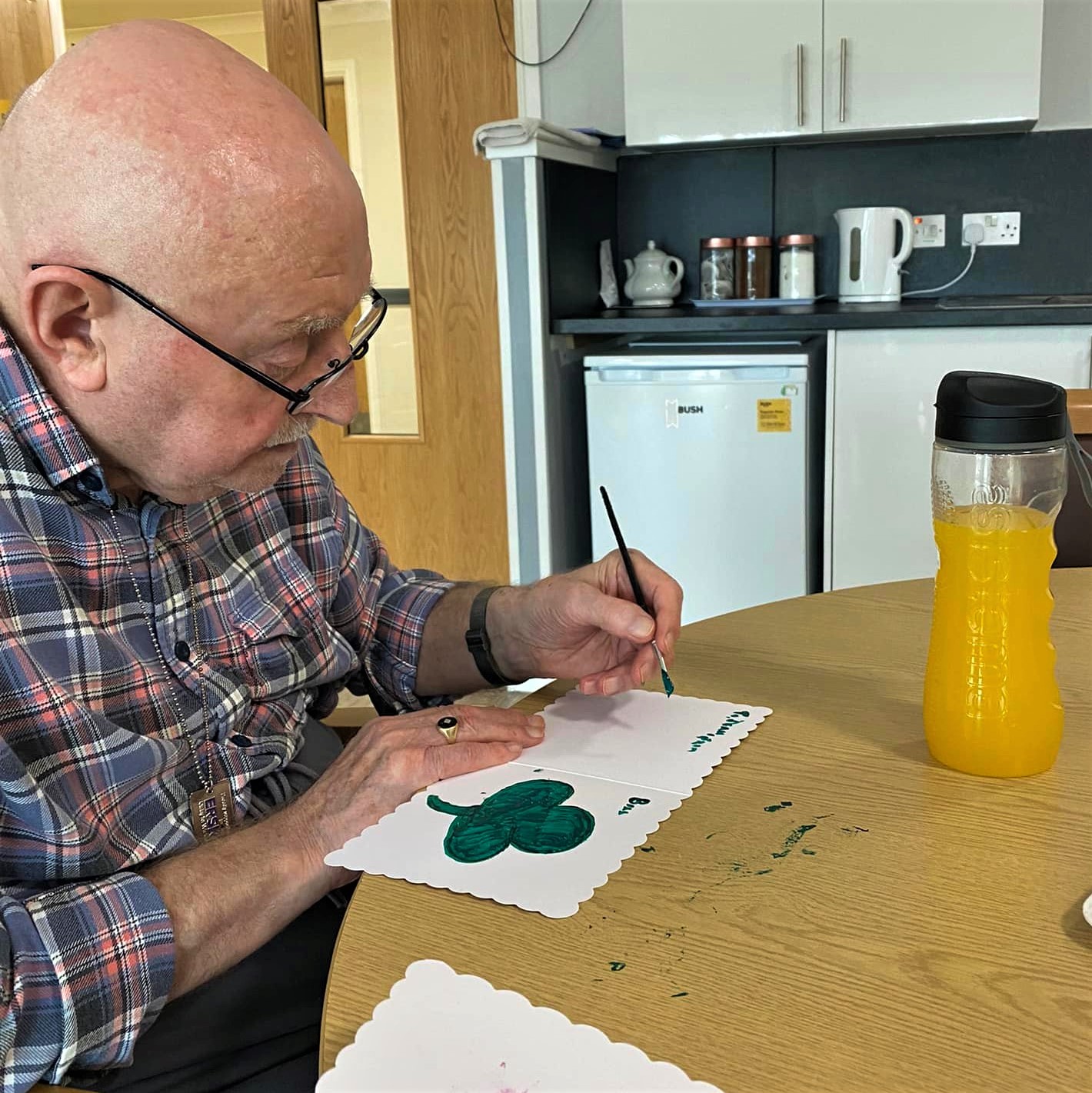 Clement Park - resident painting St Patricks day cards