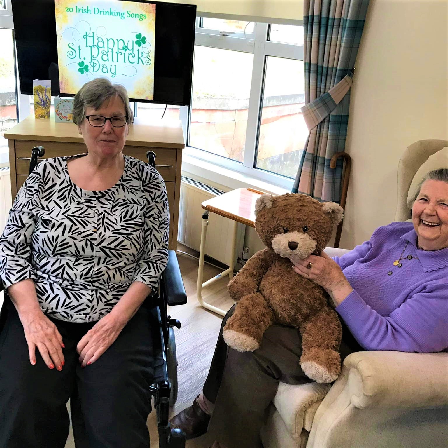 Wheatlands - residents sat in armchair with teddy