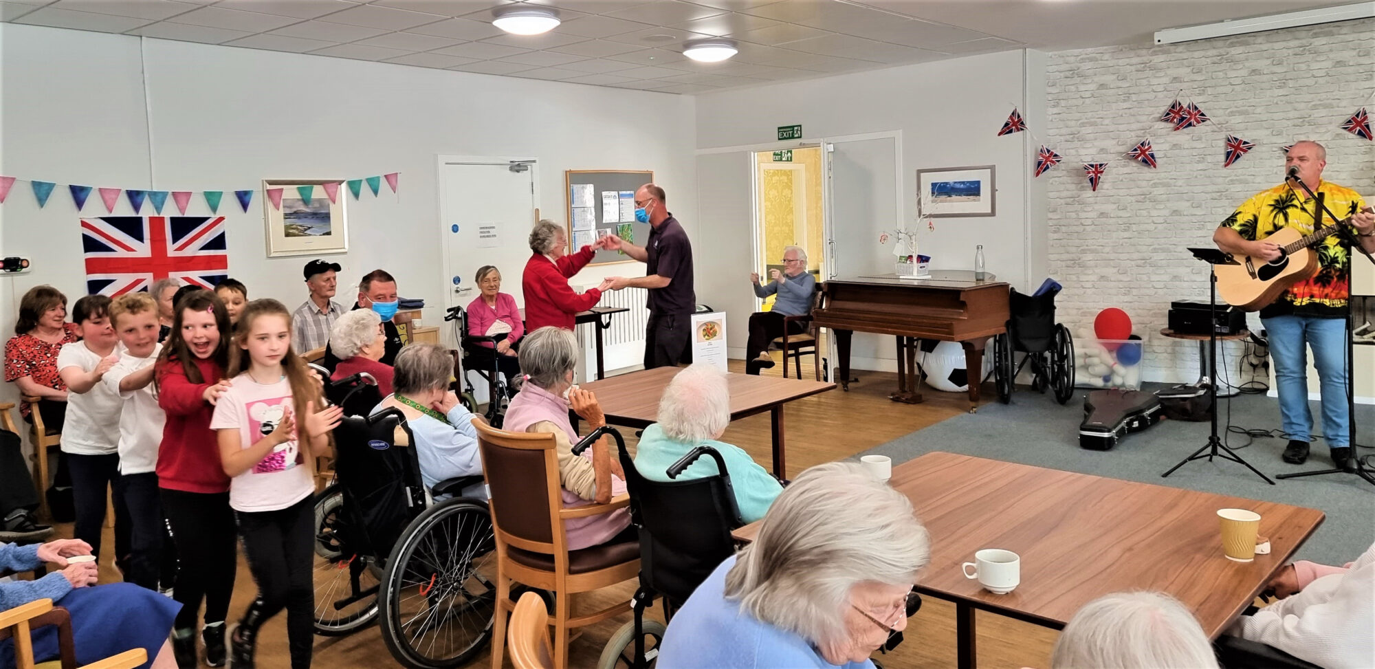 residents dancing at care home party