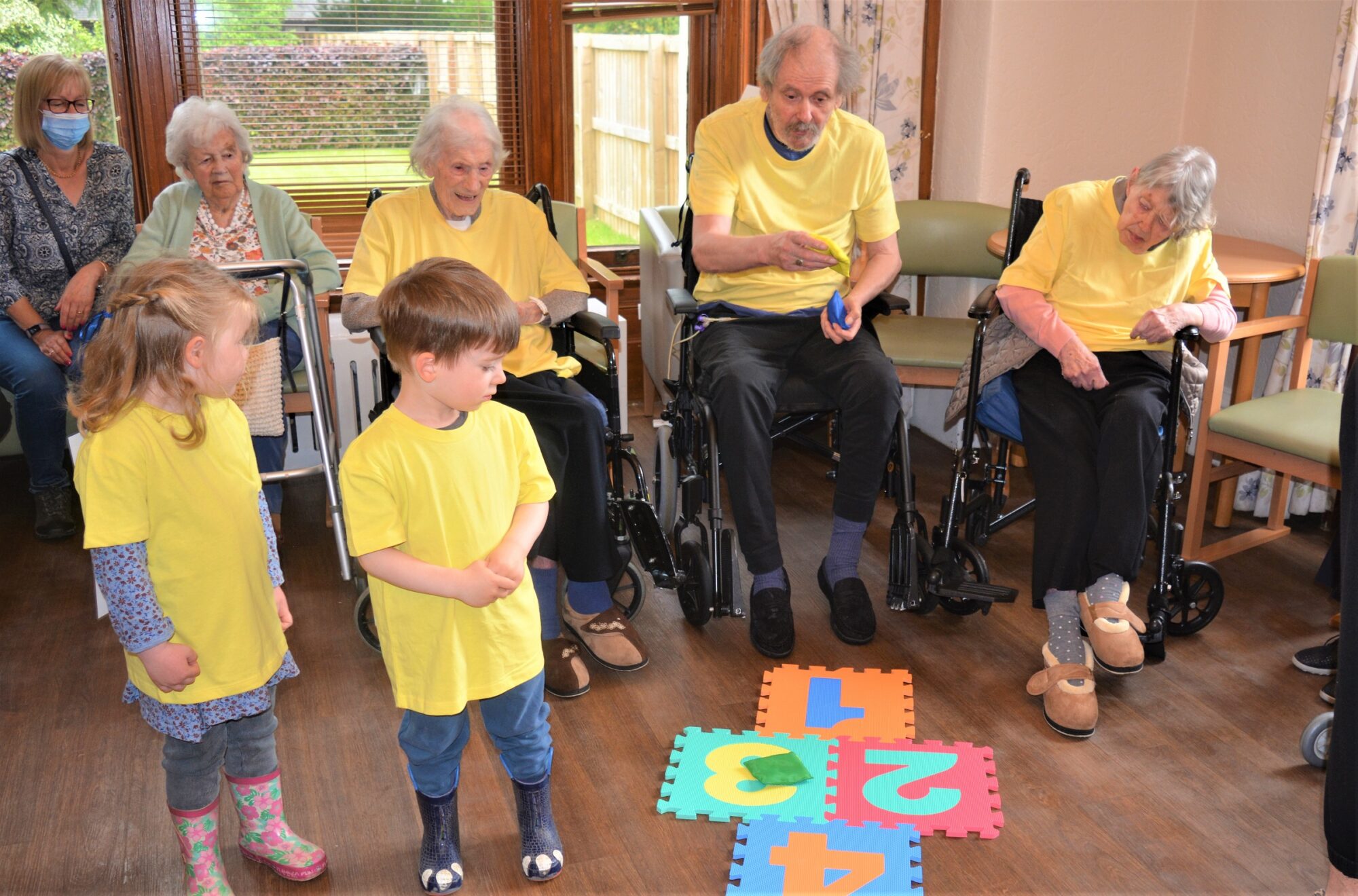 cildren and residents playing games