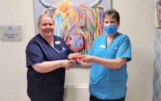 Brew Monday voucher winner Carole Thomson, a Care Assistant from Clement Park with Home Manager Cheryl Roy.