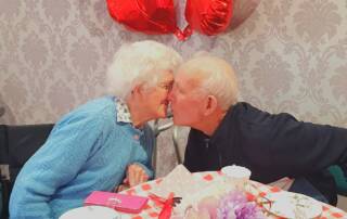 Balhousie Brookfield residents Helen and Alf Dutch celebrate Valentine's Day with a kiss.