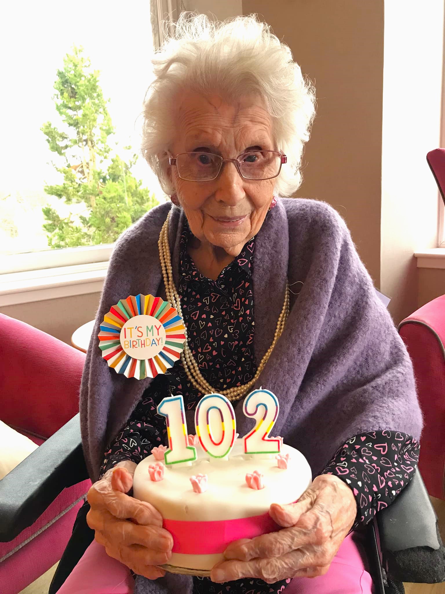 A photo of Balhousie Alastrean resident Isobel celebrating her 102nd birthday.
