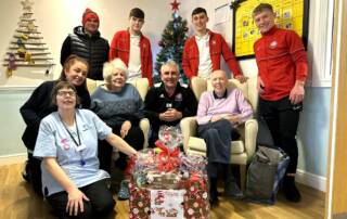 Coupar Angus FC Youth Team donate hamper to local care home.