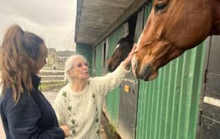 Eleanor from St Ronans visiting the horses.