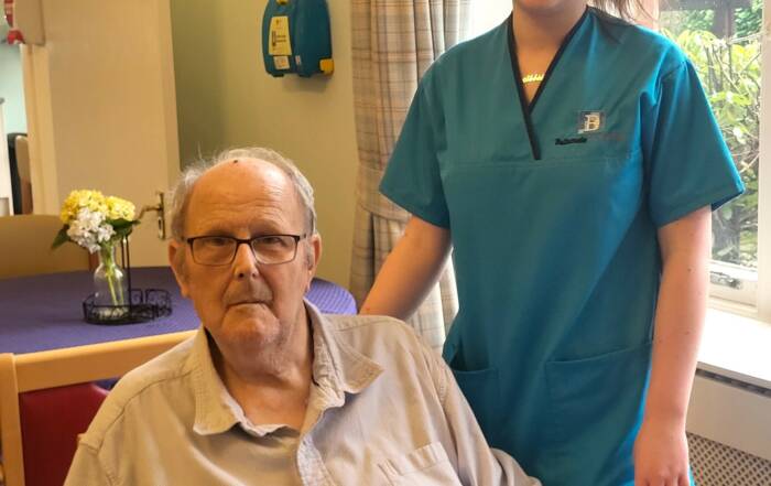 David Rattray, a resident at Balhousie Lisden care home with Care Assistant. Abbie Ogilvy