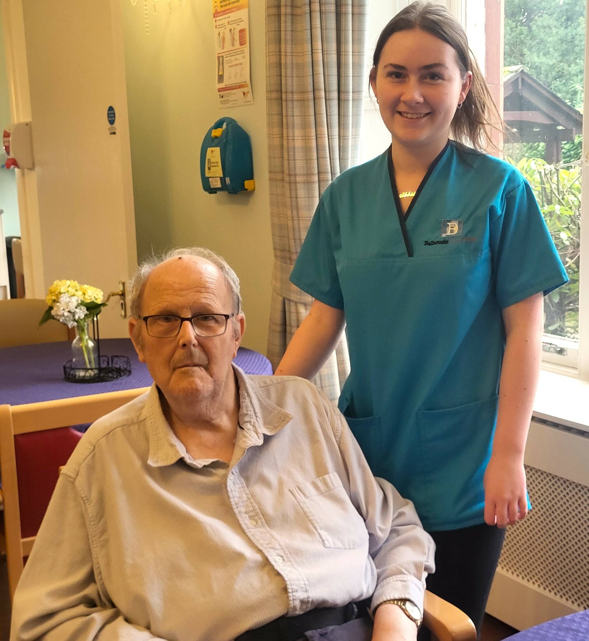 David Rattray, a resident at Balhousie Lisden care home with Care Assistant. Abbie Ogilvy